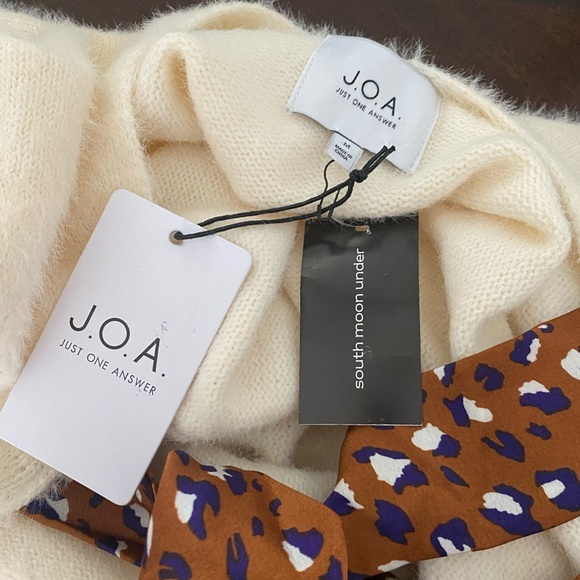 Brand new open back sweater. - Picture 3 of 3